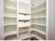 Walk-in pantry features custom shelving and ample storage space at 2980 Milford Sw Trl, Marietta, GA 30008