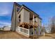 Perspective of the spacious backyard and wood deck, ideal for outdoor enjoyment at 3890 Ivy Cottage Dr, Snellville, GA 30039