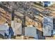 Aerial view of a house with a wooden deck and an inground area, surrounded by lush trees at 665 Ferris St, Atlanta, GA 30310