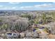 An aerial view captures a home nestled among trees, showcasing the neighborhood's serene setting at 665 Ferris St, Atlanta, GA 30310