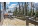 This backyard deck has wood floors with a metal railing at 665 Ferris St, Atlanta, GA 30310