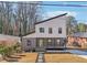 Modern two-story home with inviting front porch and lush landscaping at 665 Ferris St, Atlanta, GA 30310