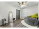 Bedroom featuring a mirror, closet, and a cozy gray beanbag chair with a green stuffed animal at 874 Fox Valley Dr, Stone Mountain, GA 30088