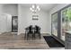 Eat-in kitchen with double doors leading to the backyard and seating for four at 874 Fox Valley Dr, Stone Mountain, GA 30088