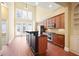 Bright kitchen features stainless steel appliances, granite countertops, and a center island with bar seating at 10462 Bent Tree Vw, Duluth, GA 30097