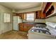Functional kitchen with classic cabinetry, white appliances, and a practical layout, ready for your culinary touch at 1815 Windsor Sw Dr, Atlanta, GA 30311