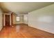Open living space with hardwood floors, ample natural light, and a decorative divider, perfect for entertaining at 1815 Windsor Sw Dr, Atlanta, GA 30311
