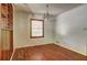 Cozy living room featuring hardwood floors, ample light, and decorative built-ins, creating an inviting atmosphere at 1815 Windsor Sw Dr, Atlanta, GA 30311