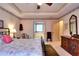 Main bedroom featuring neutral walls, carpet floors, walk-in closet and ensuite bathroom at 3740 Laurel Brook Way, Snellville, GA 30039