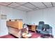 Neutral office space ready for customization to fit your business needs with drop ceiling and built in shelves and desk at 3740 Laurel Brook Way, Snellville, GA 30039