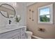 Well-lit bathroom with a vessel sink, modern fixtures, and neutral decor at 4030 Scenic View Ct, Cumming, GA 30028