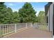 Deck with white railing and lawn views at 4030 Scenic View Ct, Cumming, GA 30028