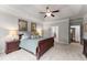 Comfortable primary bedroom with a ceiling fan, ensuite access, and neutral decor at 4815 Amble Trce, Cumming, GA 30040