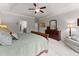 Spacious primary bedroom offering neutral decor, and ensuite access at 4815 Amble Trce, Cumming, GA 30040