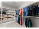 Well-organized walk-in closet with shelving and hanging racks at 4815 Amble Trce, Cumming, GA 30040
