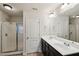 Ensuite bathroom with double sinks, shower and vanity at 6595 Story Cir, Norcross, GA 30093