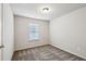 This carpeted bedroom has a window and ample natural light at 6595 Story Cir, Norcross, GA 30093