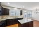 Well-appointed kitchen with granite countertops, stainless steel appliances, and ample cabinet space at 6595 Story Cir, Norcross, GA 30093