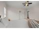 Bright bedroom features a ceiling fan and neutral decor providing a calming space to unwind at 2601 Boulder Way, Woodstock, GA 30188