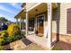 Inviting front porch with stone walkway and cozy seating area at 2601 Boulder Way, Woodstock, GA 30188