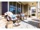 Relaxing front porch featuring rocking chairs and a welcoming ambiance at 2601 Boulder Way, Woodstock, GA 30188
