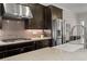 Close-up of a gourmet kitchen with sleek stainless steel appliances and a countertop sink at 2601 Boulder Way, Woodstock, GA 30188