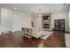 Well-lit living room with fireplace and modern decor at 2601 Boulder Way, Woodstock, GA 30188