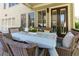 Stylish outdoor patio with comfortable seating and elegant decor at 2601 Boulder Way, Woodstock, GA 30188