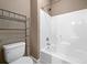 Full bathroom featuring a toilet and a shower/tub combination at 548 Myrtle Trace Ln, Suwanee, GA 30024