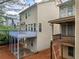 A rear exterior showing the home's private back deck and patio at 548 Myrtle Trace Ln, Suwanee, GA 30024