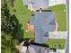 Overhead shot of a home with a backyard deck, lush green lawn and landscaped yard at 1632 Chadwick Ridge Dr, Lawrenceville, GA 30043