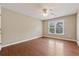 Bedroom with hardwood floors, natural light and a ceiling fan at 1632 Chadwick Ridge Dr, Lawrenceville, GA 30043