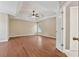 Spacious main bedroom with tray ceiling, hardwood floors, and lots of natural light at 1632 Chadwick Ridge Dr, Lawrenceville, GA 30043