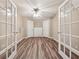 Charming office space with French doors, neutral walls, and ample lighting for a productive workspace at 1632 Chadwick Ridge Dr, Lawrenceville, GA 30043