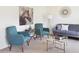 Cozy living room decorated with comfortable chairs, a sofa, and stylish decor at 2389 Argento Cir, Dacula, GA 30019