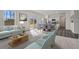 Open living space combining kitchen, dining, and living rooms with abundant natural light at 2389 Argento Cir, Dacula, GA 30019