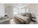 Comfortable bedroom featuring neutral tones, modern furnishings, and ample natural light at 2389 Argento Cir, Dacula, GA 30019
