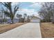 Inviting ranch home with a large driveway and attached garage at 2426 Windridge Dr, Conyers, GA 30013