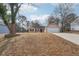 Inviting ranch home with a large driveway and attached garage at 2426 Windridge Dr, Conyers, GA 30013