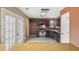 Open kitchen with stainless steel appliances and tile floors, complemented by outdoor access at 2426 Windridge Dr, Conyers, GA 30013