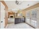View from tile kitchen into living room featuring a fireplace, great layout for gatherings at 2426 Windridge Dr, Conyers, GA 30013
