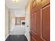Open entryway leads to living room featuring carpet floors and fireplace at 2426 Windridge Dr, Conyers, GA 30013