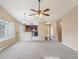 Open-concept floorplan with living room, kitchen, and dining areas at 2426 Windridge Dr, Conyers, GA 30013
