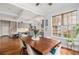 Elegant dining area with a large table, stylish chairs, and natural light at 2920 Stanway Ave, Douglasville, GA 30135