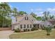 Beautiful brick home showcasing manicured landscaping and a curved walkway at 2920 Stanway Ave, Douglasville, GA 30135