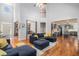 Bright and airy living room with hardwood floors offering ample space for furniture at 2920 Stanway Ave, Douglasville, GA 30135