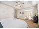 Large primary bedroom with tray ceiling and access to a private balcony at 2920 Stanway Ave, Douglasville, GA 30135