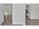 Bright hallway view showcasing the layout and connection to other rooms at 4140 Chapel Hill Reserve, Douglasville, GA 30135