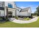 Charming front entrance with double doors, manicured landscaping, and a curved sidewalk at 445 Roper Rd, Canton, GA 30115