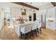 Spacious kitchen with stainless steel appliances, hardwood floors and large central island at 445 Roper Rd, Canton, GA 30115